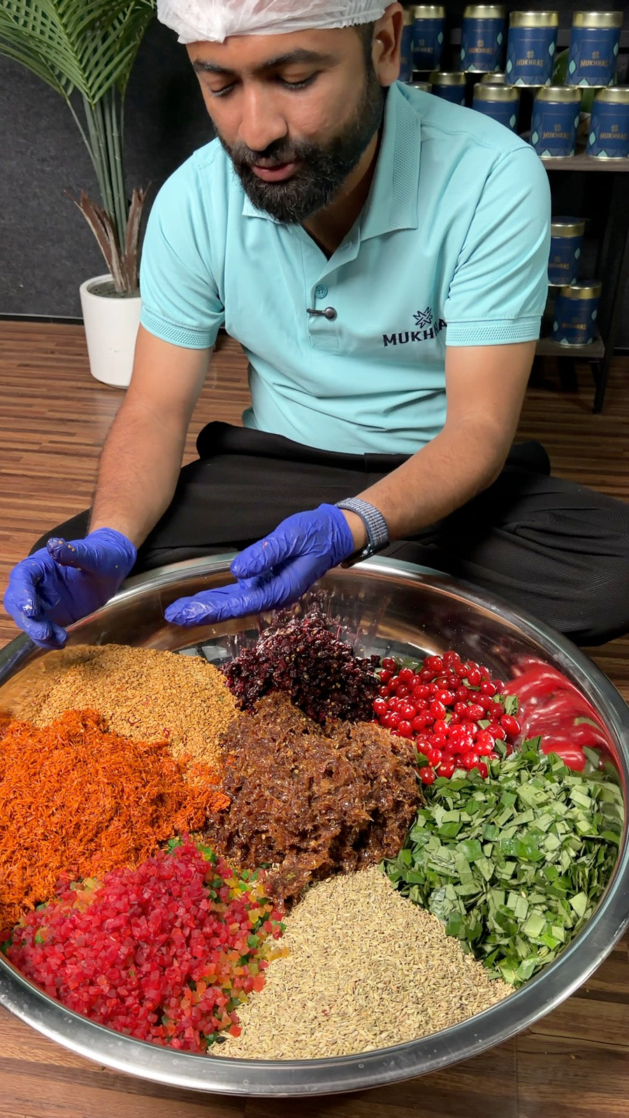 Each ingredient in its own heap in a large steel bowl, before mixing