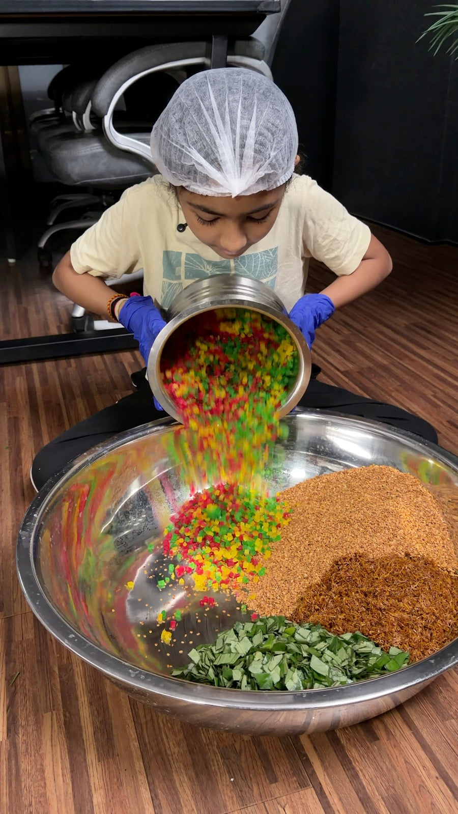 Tutti frutti being poured into the mixing bowl